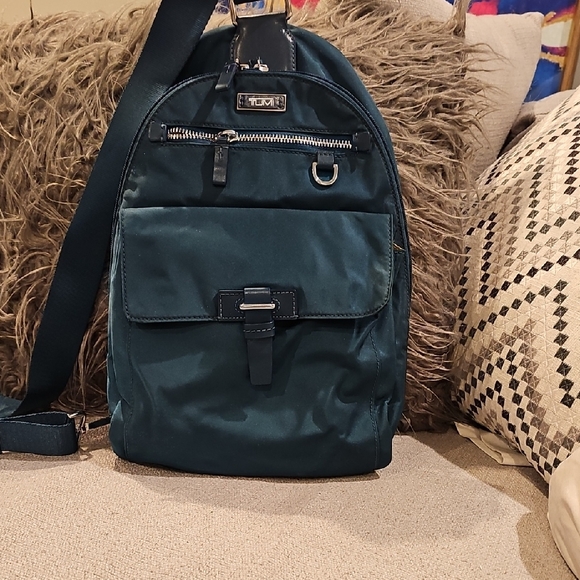 Tumi Handbags - Tumi Teal Sling Bag with Front Pocket and Strap